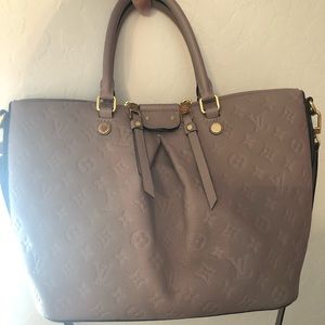 Louis Vuitton grayish leather bag
